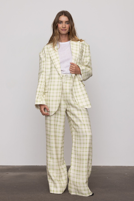 Our 'Frankie' trousers are patterned with classic plaid in a subdued leaf green, making them completely versatile. They're tailored from linen with a high-rise waist that falls to sweeping wide legs. Style yours with the matching Blazer.