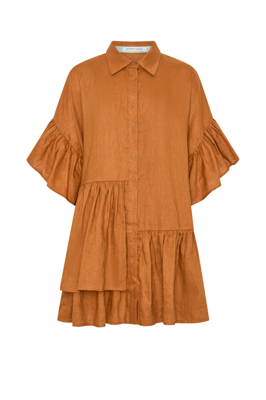 Rust-hued linen in an easy oversized mini dress with short ruffle sleeves and collar, the Genoa is a quiet statement of relaxed, Mediterranean charm. Side pockets add practicality, while the breathable fabric invites all-day ease.