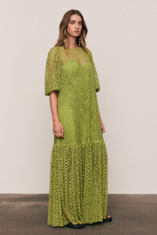 Elegant and enduring, the Ellie Lace Dress is crafted from a lightweight cotton-blend lace in radiant Citron, with a removable cotton slip for easy layering. Designed for a relaxed, graceful fit with voluminous sleeves and subtle texture, it embodies effortless bohemian refinement.