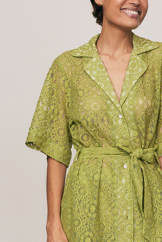 A best-selling Bohemian Traders silhouette, reimagined in vibrant Citron lace. Worn by women of influence globally, this softly structured shirt features a relaxed fit, shell buttons and a self-tie waist. Crafted from a premium cotton blend lace, it delivers effortless elegance and everyday ease. Available in our size-inclusive range from 6–22.