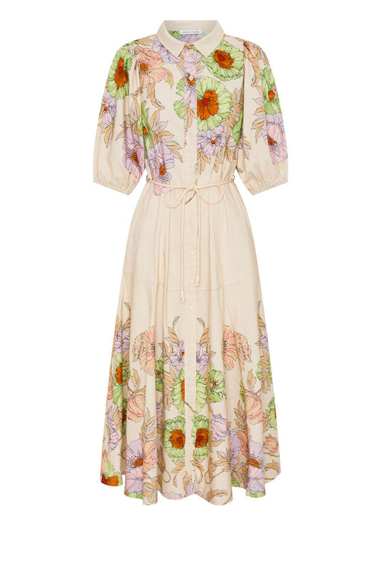 This premium linen blend midi dress is a study in effortless volume and artful print. Intended for a fluid, loose fit, the silhouette is balanced by a classic collar and a smooth button-down front, allowing the fabric to drape beautifully. Voluminous puff sleeves and a flowing midi skirt showcase the custom-designed floral placement print. This is a graceful, seasonless piece that combines comfort with sophistication, ensuring ultimate longevity in your modern capsule wardrobe.