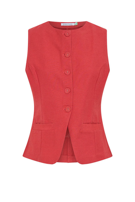 Tailored from a mid-weight linen blend, the Shaped Cotton Vest sculpts the form with confident ease. A modern classic defined by clean lines, subtle structure, and natural texture, it’s perfect worn alone or layered. Designed to carry you through the festive season, this piece channels effortless refinement and the quiet luxury of breathable natural fibres. Wear yours with the matching skirt or the Gingham Cropped Flare.