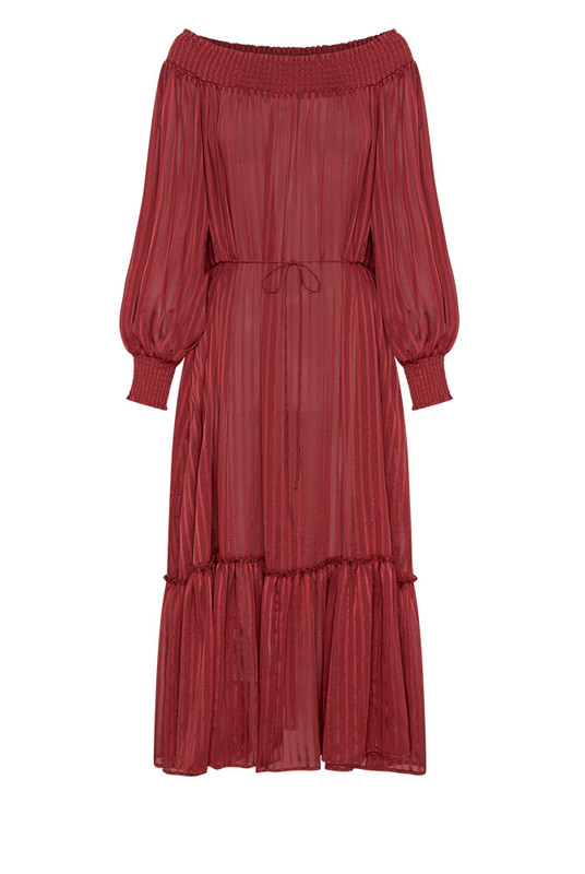 Luminous and luxurious, the Lurex Maxi Dress is crafted from a custom-dyed lurex-stripe blend, developed exclusively to Bohemian Traders’ exacting standards. Its off-shoulder neckline, voluminous balloon sleeves, and waist tie create a silhouette of effortless drama. Light-catching and fluid, it moves like liquid sunlight - a true statement of artistry and occasion-ready elegance.