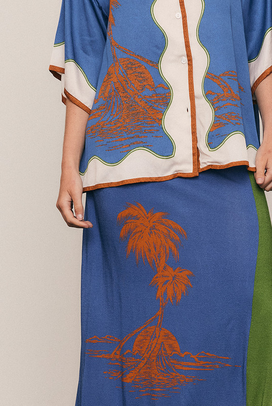 Sleek and effortless, this Viscose Jersey Skirt is crafted from silky viscose with a Bohemian Traders exclusive placement print. Cut straight with an elegant side split, it skims the body with soft drape and gentle movement. Lightweight and versatile, it transitions beautifully from relaxed days to golden summer evenings with ease.