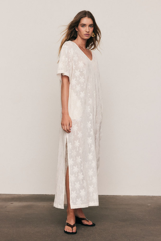 Artful and effortless, the Cotton Lace Tee Dress is crafted from a premium knitted cotton-blend lace featuring Bohemian Traders’ signature palm motif. With a relaxed, oversized silhouette and wide short sleeves, it drapes beautifully for summer days. A breathable natural-fibre piece designed for comfort, texture, and graceful movement under the sun.
