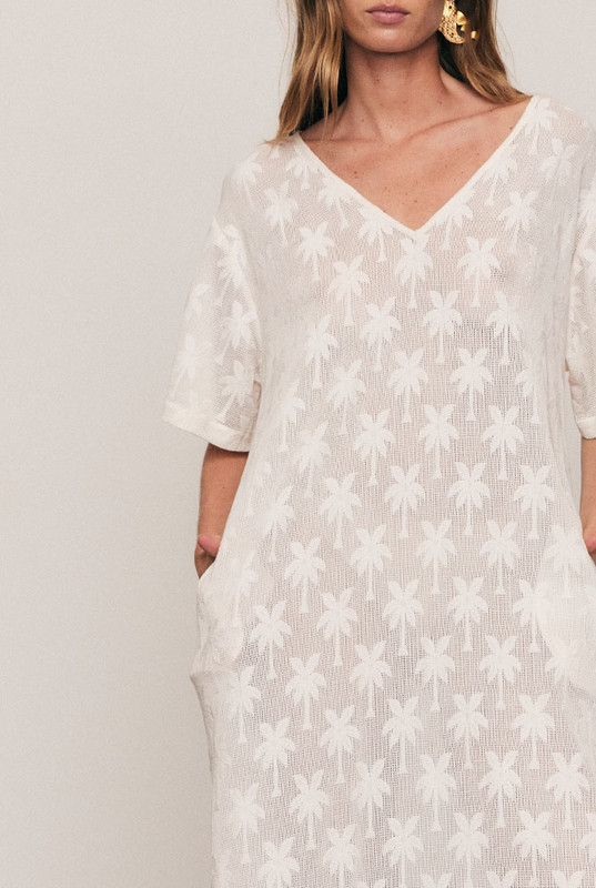 Artful and effortless, the Cotton Lace Tee Dress is crafted from a premium knitted cotton-blend lace featuring Bohemian Traders’ signature palm motif. With a relaxed, oversized silhouette and wide short sleeves, it drapes beautifully for summer days. A breathable natural-fibre piece designed for comfort, texture, and graceful movement under the sun.
