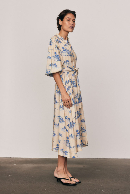 Effortless and elegant, the Kauai Drop Waist Shirt Dress is crafted from soft viscose in Bohemian Traders’ exclusive Kauai print. With a relaxed drop waist, delicate bell sleeves and a removable tie belt, it drapes beautifully through a midi-length silhouette. Lightweight and breathable, it’s timeless summer dressing - natural, feminine, and easy to wear.