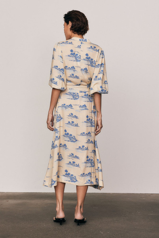 Effortless and elegant, the Kauai Drop Waist Shirt Dress is crafted from soft viscose in Bohemian Traders’ exclusive Kauai print. With a relaxed drop waist, delicate bell sleeves and a removable tie belt, it drapes beautifully through a midi-length silhouette. Lightweight and breathable, it’s timeless summer dressing - natural, feminine, and easy to wear.