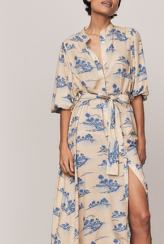 Effortless and elegant, the Kauai Drop Waist Shirt Dress is crafted from soft viscose in Bohemian Traders’ exclusive Kauai print. With a relaxed drop waist, delicate bell sleeves and a removable tie belt, it drapes beautifully through a midi-length silhouette. Lightweight and breathable, it’s timeless summer dressing - natural, feminine, and easy to wear.