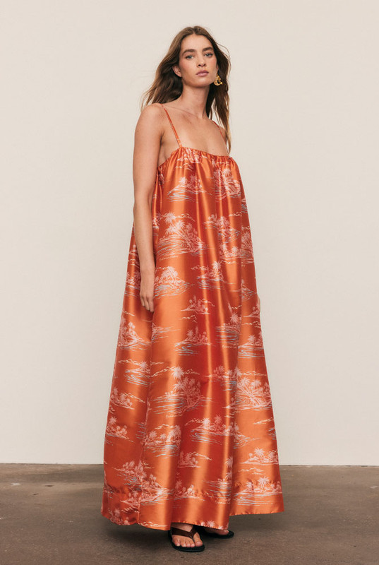 Designed for moments that linger long after sunset, the Kauai Maxi Dress is crafted from soft woven viscose in Bohemian Traders’ exclusive Kauai print. With a gathered neckline and fluid drape, it moves with quiet confidence and effortless grace. A statement piece for summer occasions, it's refined, artful, and made to shine after dark.
