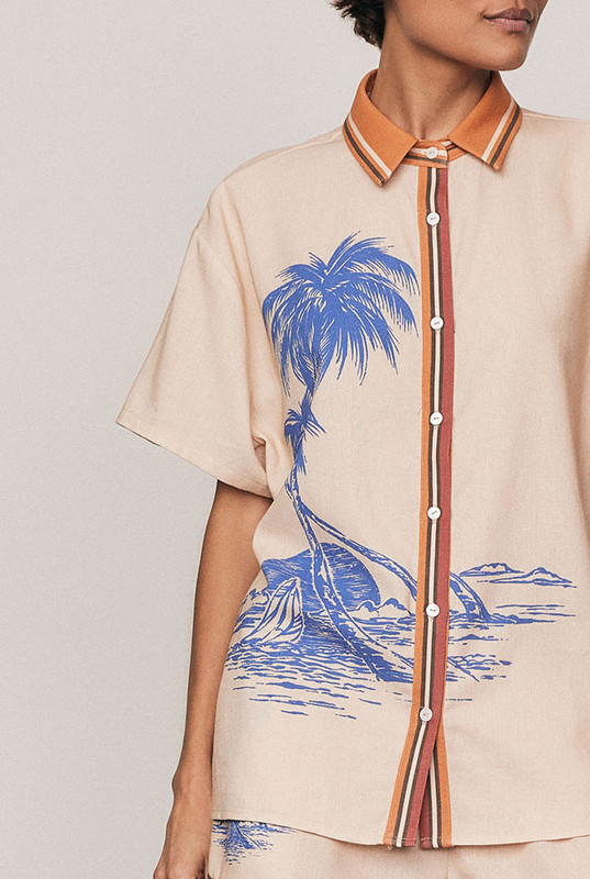 The Kauai Short Sleeve Shirt blends relaxed tailoring with refined ease. Crafted from a premium linen blend and finished with Bohemian Traders’ custom Kauai placement print, it features a classic collar and softly draped short sleeves. An elevated summer essential thats breathable, versatile, and made to pair effortlessly with the matching Kauai Pant.