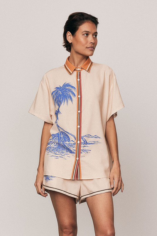The Kauai Short Sleeve Shirt blends relaxed tailoring with refined ease. Crafted from a premium linen blend and finished with Bohemian Traders’ custom Kauai placement print, it features a classic collar and softly draped short sleeves. An elevated summer essential thats breathable, versatile, and made to pair effortlessly with the matching Kauai Pant.