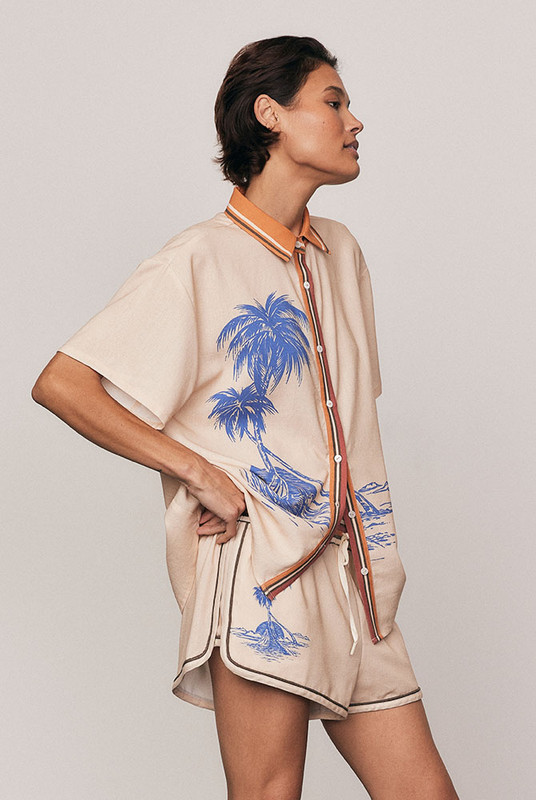 The Kauai Short Sleeve Shirt blends relaxed tailoring with refined ease. Crafted from a premium linen blend and finished with Bohemian Traders’ custom Kauai placement print, it features a classic collar and softly draped short sleeves. An elevated summer essential thats breathable, versatile, and made to pair effortlessly with the matching Kauai Pant.