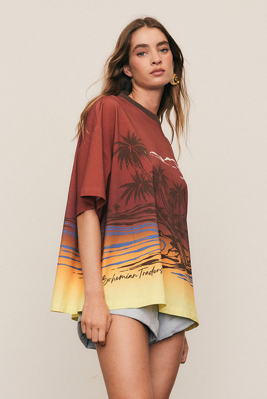 Relaxed and playful, the Balmy Oversized Tee is cut from soft cotton jersey and finished with a bold in-house placement print. The contrast neckline adds a hint of athleticism, while its oversized silhouette makes it the perfect everyday uniform. It's effortless, expressive, and confidently casual in signature Bohemian Traders style.
