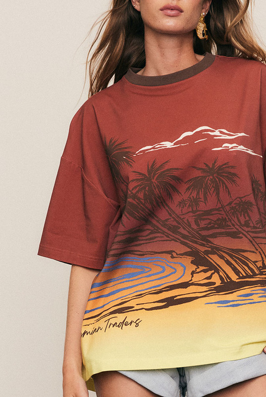 Relaxed and playful, the Balmy Oversized Tee is cut from soft cotton jersey and finished with a bold in-house placement print. The contrast neckline adds a hint of athleticism, while its oversized silhouette makes it the perfect everyday uniform. It's effortless, expressive, and confidently casual in signature Bohemian Traders style.
