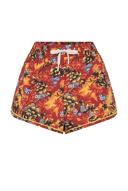 Cut from crisp printed rayon, the Kai Sporty Short combines comfort and craftsmanship. Featuring an elasticated waist, drawcord, and contrast piping, it’s tailored for easy movement and polished structure. Style it with the matching Kai Short Sleeve Shirt to create a coordinated look that transitions seamlessly from coastal mornings to city afternoons.