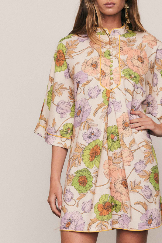 This linen-cotton blend mini dress is defined by its artful, in-house floral print and relaxed tailoring. Designed for a comfortable, breezy fit, its mandarin collar, wide half-length sleeves, and crisp A-line silhouette offer sophisticated simplicity. Piping detail and functional side pockets ensure an elevated utility, making this an effortlessly modern piece for your summer capsule wardrobe.
