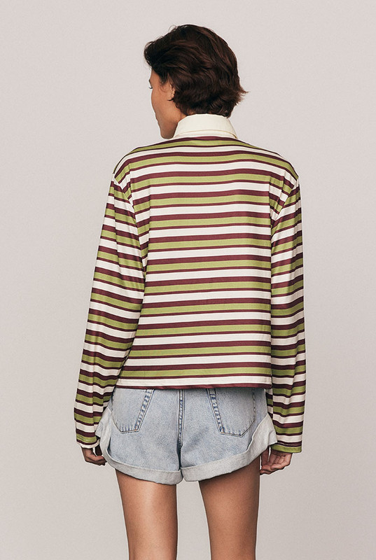 A modern take on an off-duty classic, the Maggie Rugby Tee is cut from soft, slinky polyester in multi-coloured stripes. Designed with a contrast collar, long wide sleeves, and embroidered logo, it blends nostalgic sport styling with everyday dressing. Wear it loose or belted for bold, relaxed refinement that feels unmistakably Bohemian Traders.