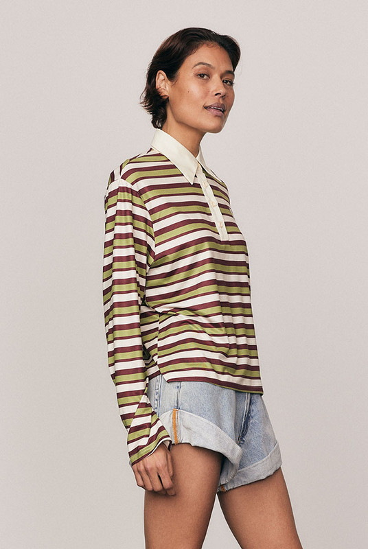 A modern take on an off-duty classic, the Maggie Rugby Tee is cut from soft, slinky polyester in multi-coloured stripes. Designed with a contrast collar, long wide sleeves, and embroidered logo, it blends nostalgic sport styling with everyday dressing. Wear it loose or belted for bold, relaxed refinement that feels unmistakably Bohemian Traders.