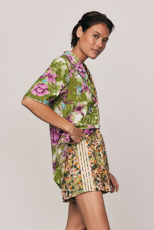 Soft and expressive, the Ivy Shirt is crafted from lightweight cotton voile featuring Bohemian Traders’ exclusive spliced print. Designed with short sleeves, a resort collar, and refined piping detail, it offers an easy, relaxed fit that feels both bold and effortless. Pair with the matching Ivy Sport Short for a cohesive, artful summer set.