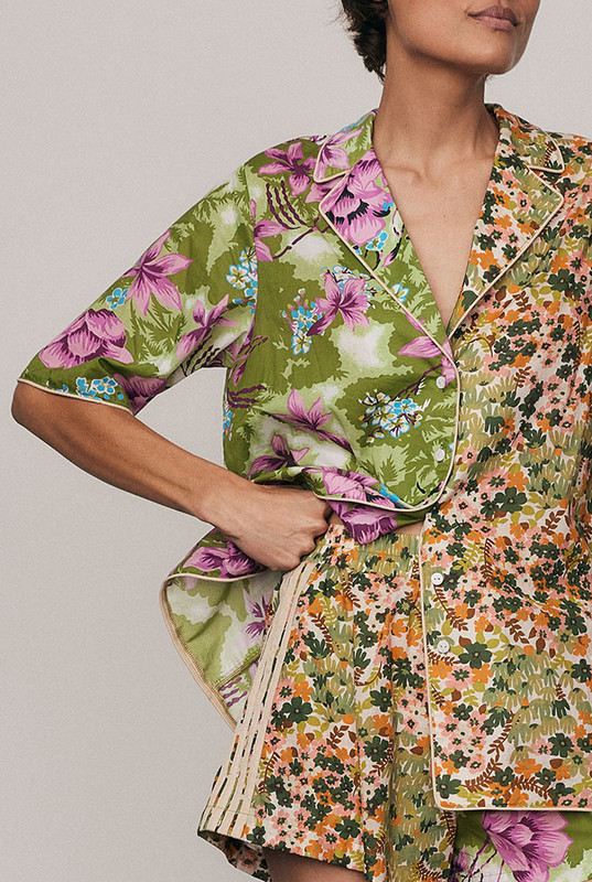 Soft and expressive, the Ivy Shirt is crafted from lightweight cotton voile featuring Bohemian Traders’ exclusive spliced print. Designed with short sleeves, a resort collar, and refined piping detail, it offers an easy, relaxed fit that feels both bold and effortless. Pair with the matching Ivy Sport Short for a cohesive, artful summer set.