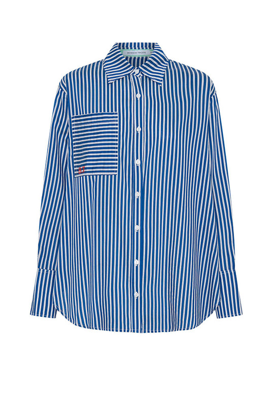 Timeless and versatile, the Stripe Classic Shirt is crafted from a premium Rayon–Tencel blend in a crisp stripe that drapes with ease. Designed in an oversized silhouette with a classic collar and subtle red Bohemian Traders embroidery, it pairs perfectly with the matching Stripe Short for an elevated, coordinated take on modern summer shirting.