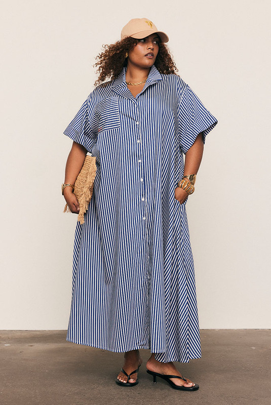 A reinvention of our best-selling Opera Shirt Dress, this new-season update arrives in a soft Rayon–Tencel blend with short sleeves and a camp collar, reimagined for high summer. Refined red Bohemian Traders embroidery adorns the chest, while the fluid stripe fabric and relaxed tailoring offer effortless versatility — the perfect balance of structure and ease.