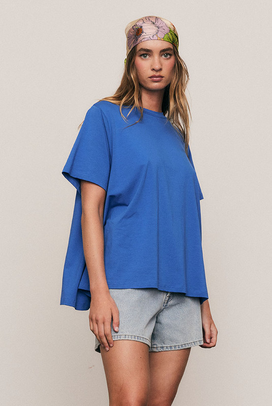 The Oversized Swing Tee in soft cotton blend jersey combines comfort and flow with modern ease. Its generous swing hem and relaxed fit make it endlessly versatile — perfect for layering or wearing solo. Machine washable and size inclusive, it’s your elevated everyday tee.
