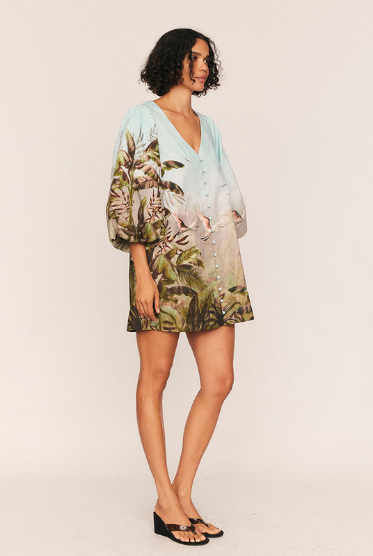 The Canopy Billow Sleeve Mini Dress brings bold softness to a playful silhouette. Crafted from premium textured cotton with Bohemian Traders’ custom placement print, it combines a relaxed fit with striking structure for an elevated everyday piece.