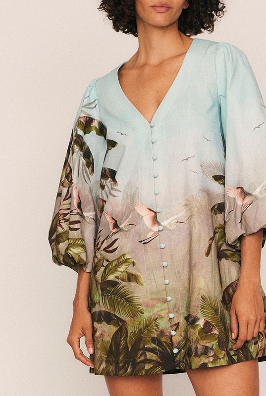 The Canopy Billow Sleeve Mini Dress brings bold softness to a playful silhouette. Crafted from premium textured cotton with Bohemian Traders’ custom placement print, it combines a relaxed fit with striking structure for an elevated everyday piece.