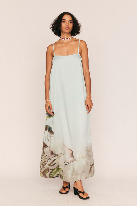 Sleek, understated, and designed to glide, The Canopy Maxi Gown is a study in elegance. Cut from lightweight matte satin with a painterly Bohemian Traders placement print, this mixi-length column dress falls fluidly with every step.