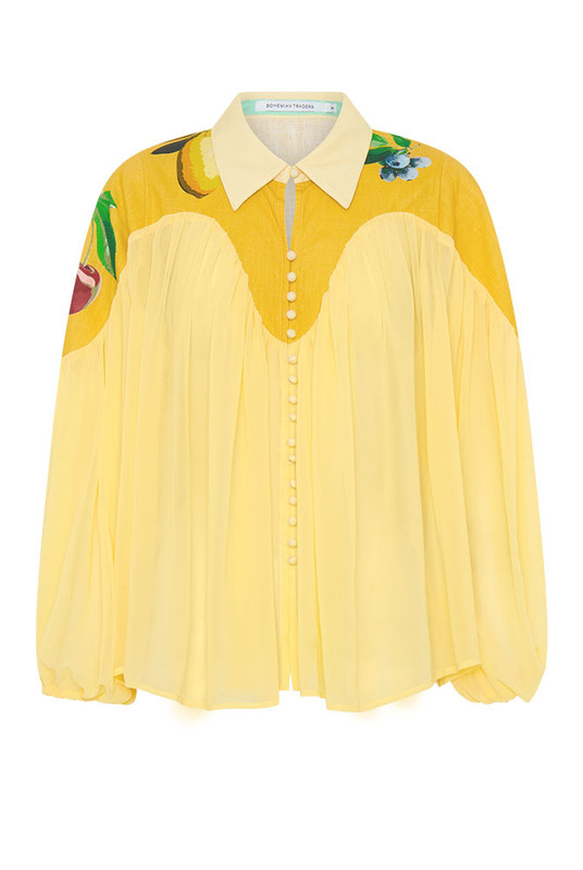 A celebration of playful sophistication, the Fruito Yoke Blouse offers an artistic twist on everyday style. Cut from airy crepe georgette in Bohemian Traders’ exclusive fruit-inspired print, this semi-sheer blouse features a crisp cotton yoke for subtle contrast and structure.