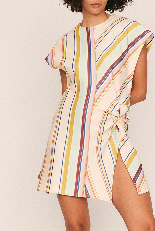 Artful and uncomplicated, the Marie Mini Split Dress balances sculptural lines with easy femininity. Crafted from premium stretch ponte in Bohemian Traders’ custom in-house print, this mini dress skims the body in an A-line silhouette that flatters without clinging.