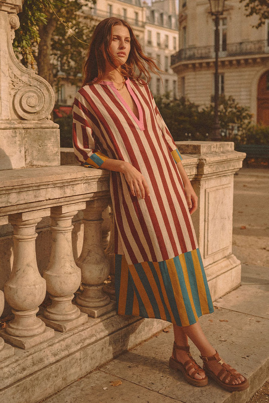 Effortlessly elegant and thoughtfully undone, the Marie Striped Kaftan Dress is a signature piece in Bohemian Traders’ Paris-inspired CAMILLE collection. Crafted from a breathable, mid-weight linen-cotton blend, this kaftan features our exclusive in-house spliced print—an artistic nod to painterly strokes.
