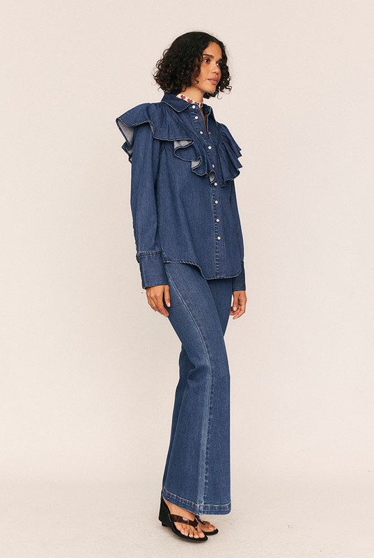 Bohemian Traders is renowned for its premium, size-inclusive denim—and the High Rise Flare Jean is no exception. Crafted from soft, mid-weight stretch denim, this figure-flattering fit hugs the waist and hips before kicking out into a full-length flared leg that adds instant polish.