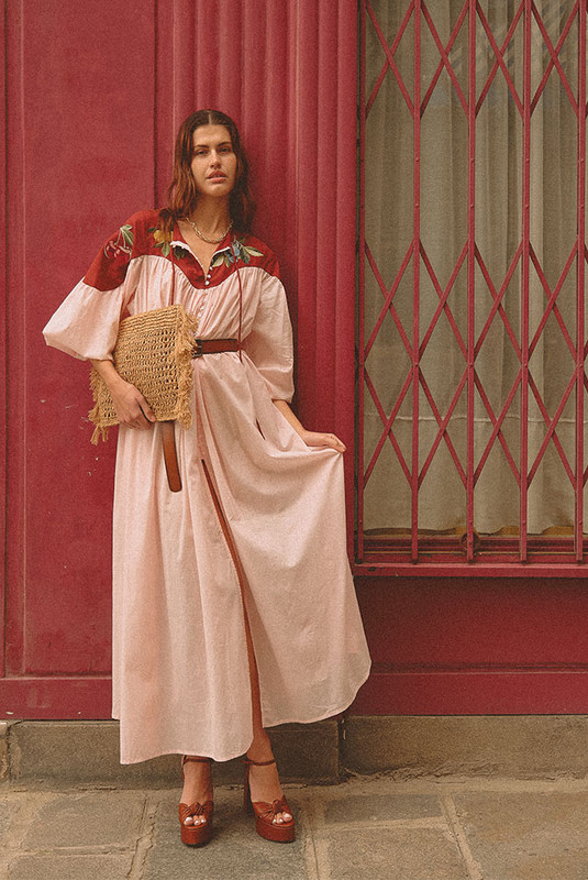 Whimsical yet grounded, the Fruito Bib Smock brings artistry to everyday wear. Crafted from soft cotton voile with a textured cotton yoke, this oversized silhouette is adorned with embroidered fruit motifs—a signature touch from Bohemian Traders’ in-house design team.