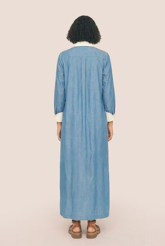 Classic shirting meets bold expression in the Paisley Shirt Dress—a modern maxi cut from structured cotton poplin with a striking Bohemian Traders placement print. Designed for a relaxed, easy fit, it features a sharp collar, long cuffed sleeves, and a full button-through front for styling versatility.