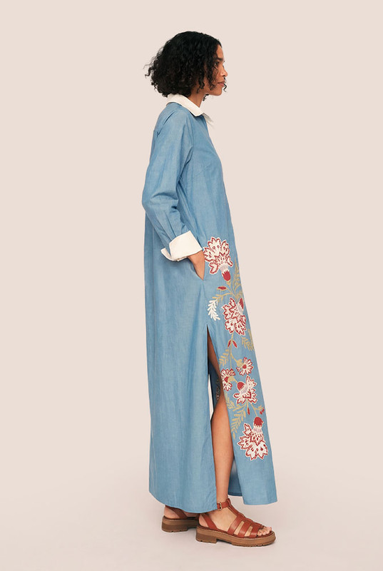 Classic shirting meets bold expression in the Paisley Shirt Dress—a modern maxi cut from structured cotton poplin with a striking Bohemian Traders placement print. Designed for a relaxed, easy fit, it features a sharp collar, long cuffed sleeves, and a full button-through front for styling versatility.