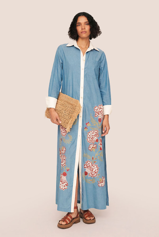 Classic shirting meets bold expression in the Paisley Shirt Dress—a modern maxi cut from structured cotton poplin with a striking Bohemian Traders placement print. Designed for a relaxed, easy fit, it features a sharp collar, long cuffed sleeves, and a full button-through front for styling versatility.