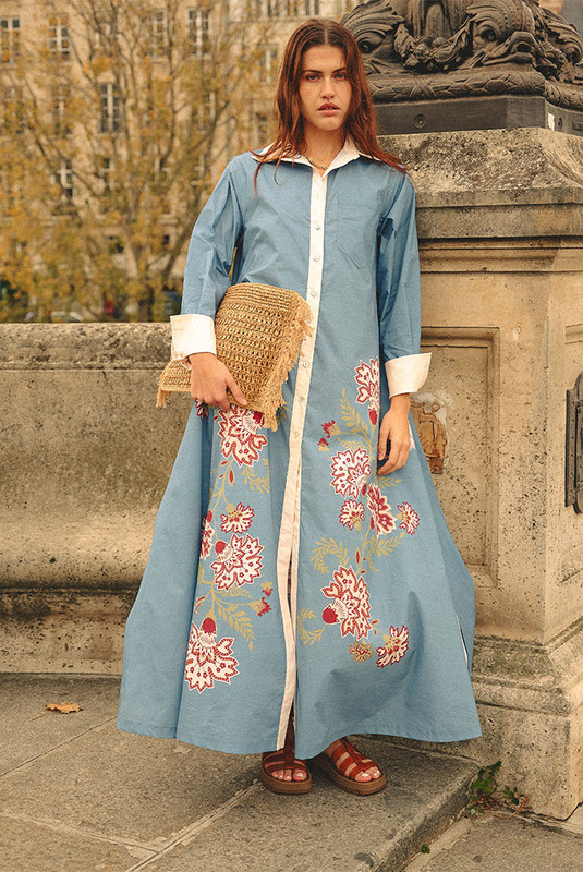 Classic shirting meets bold expression in the Paisley Shirt Dress—a modern maxi cut from structured cotton poplin with a striking Bohemian Traders placement print. Designed for a relaxed, easy fit, it features a sharp collar, long cuffed sleeves, and a full button-through front for styling versatility.