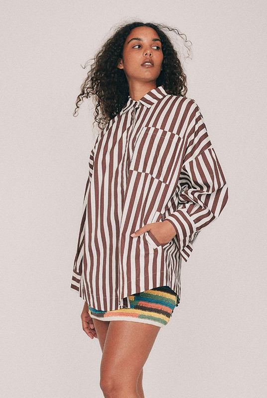 Cut from crisp cotton poplin, this oversized striped shirt is finished with a classic collar, long cuffed sleeves and a patch pocket at the chest and practical pockets to the sides. Wear it buttoned and tucked through the week, or open over everything on a Saturday. Intended to be oversized, so size down for a closer fit. Designed from a 6 to a 22.