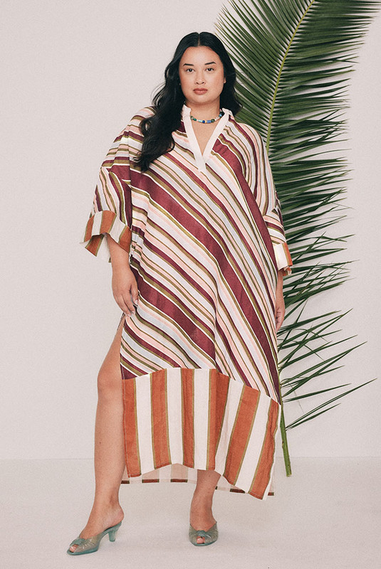 Cut from pure linen, this striped kaftan maxi dress is oversized with a contrast cream neckline and wide contrast cuffs. Pockets sit in the side seams and there are no fastenings to arrange making it the perfect one-and-done look. It's the dress for long lunches and days spent seaside. Designed from a 6 to a 22.