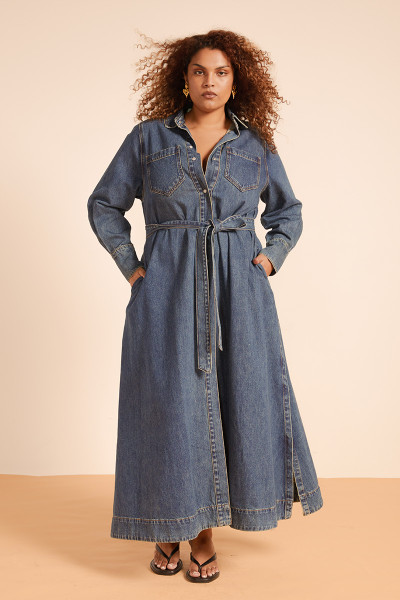 We've put our Bohemian Traders spin on classic workwear to create this blue denim shirt dress, which features a detachable self belt. It has a slimmer fit than it's Opera Shirt Dress companion. 