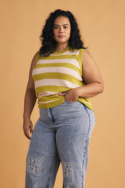 Our knit raglan vest is made from cotton that's so light and breezy. It has chartreuse and blush stripes and it designed for a slightly loose shape tempered by a fitted band at the hem. Wear yours with everything from denim to the Frankie Trouser.