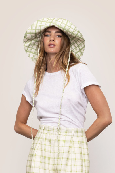 Our 'Frankie' bucket hat is made from breathable linen and has coordinating ties, so you can tweak the shape.