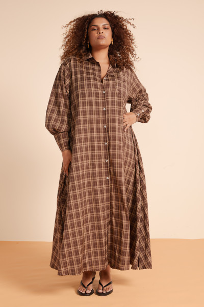 Checks take on a new level of ease in this midi opera dress, crafted from soft, drapey polyester blend. With full sleeves, a classic collar, and side pockets, the Brown Plaid offers effortless polish for those cooler days when you want warmth without compromise.