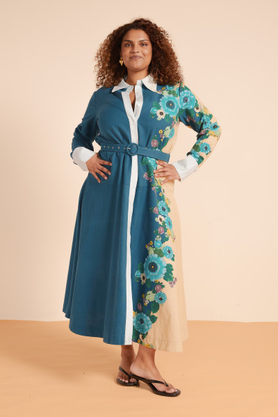 Soft linen and cotton blend meets tailored details in this maxi shirt dress featuring a mandarin collar and self-fabric belt. The Waterbeds print channels Sicilian sun and sea, while balloon sleeves and side pockets add movement and ease. Wear it loose or cinched for a quietly captivating statement.