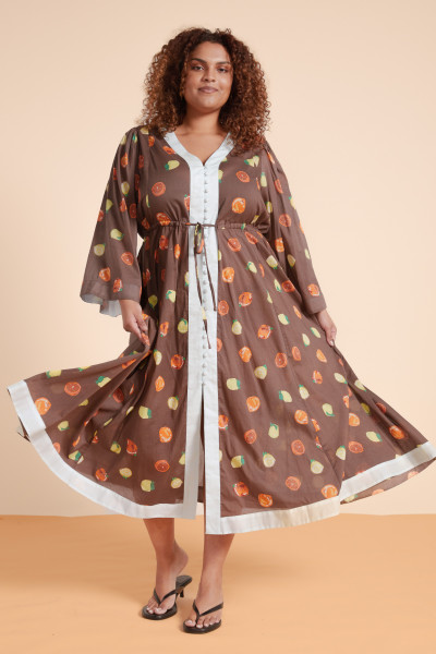 Breezy cotton voile meets warm, earthy prints in this Harvest Kaftan maxi. Flared sleeves and a low V-neckline bring effortless movement and style, while side pockets add a touch of everyday practicality. Perfect look to carry you from the beach to the bar.