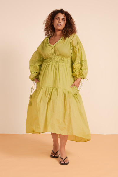 The Lace Billow Sleeve Maxi Dress in olive is crafted from crisp cotton organdy with delicate lace inserts. Featuring a deep V neckline, tiered skirt, and soft billow sleeves, it’s fitted at the waist and effortlessly relaxed through the body - made for easy, romantic dressing.