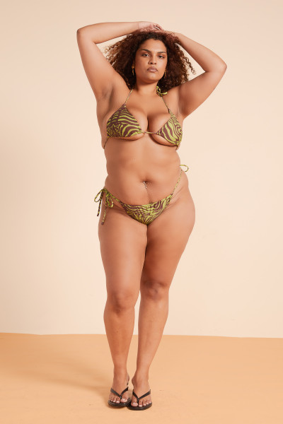 Mix playful detail with flattering fit in this bikini brief. Side ties and adjustable gathers complement the sleek silhouette in our iconic zebra print, fully lined for confidence and comfort. Mix playful detail with flattering fit in this bikini brief. Side ties and adjustable gathers complement the sleek silhouette in our iconic zebra print, fully lined for confidence and comfort.